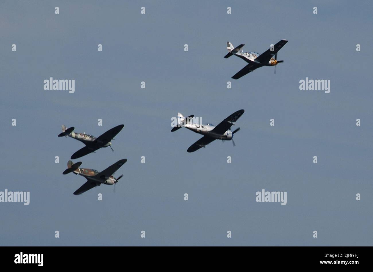 World War II restored fighter planes in flight Stock Photo