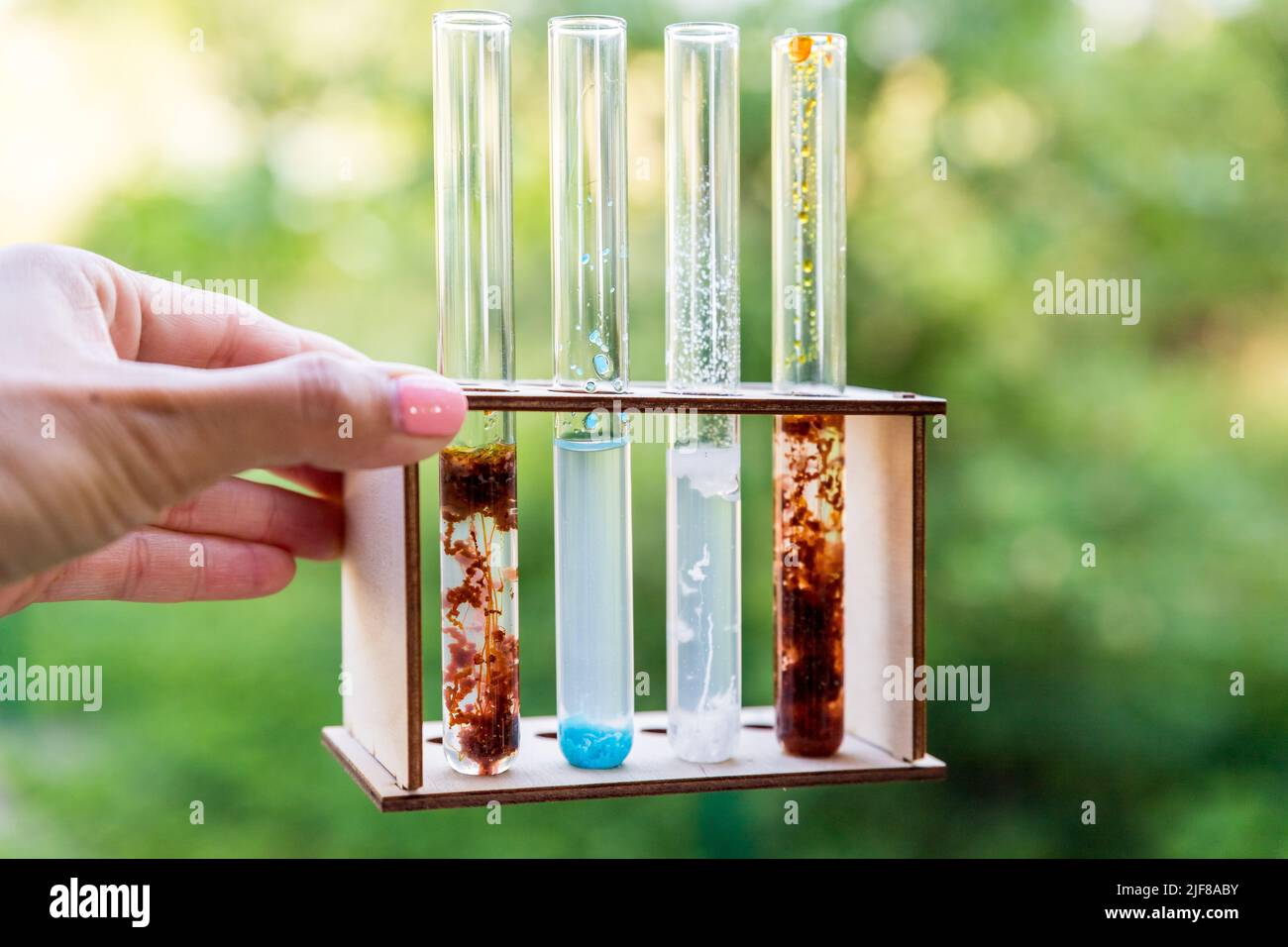 chemical reaction at chemistry laboratory concept of child prodigy