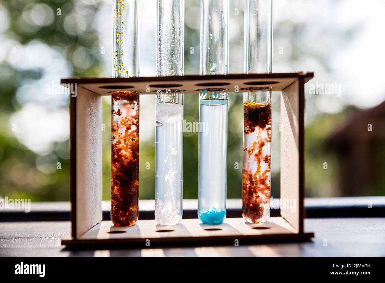 chemical reaction at chemistry laboratory concept of child prodigy