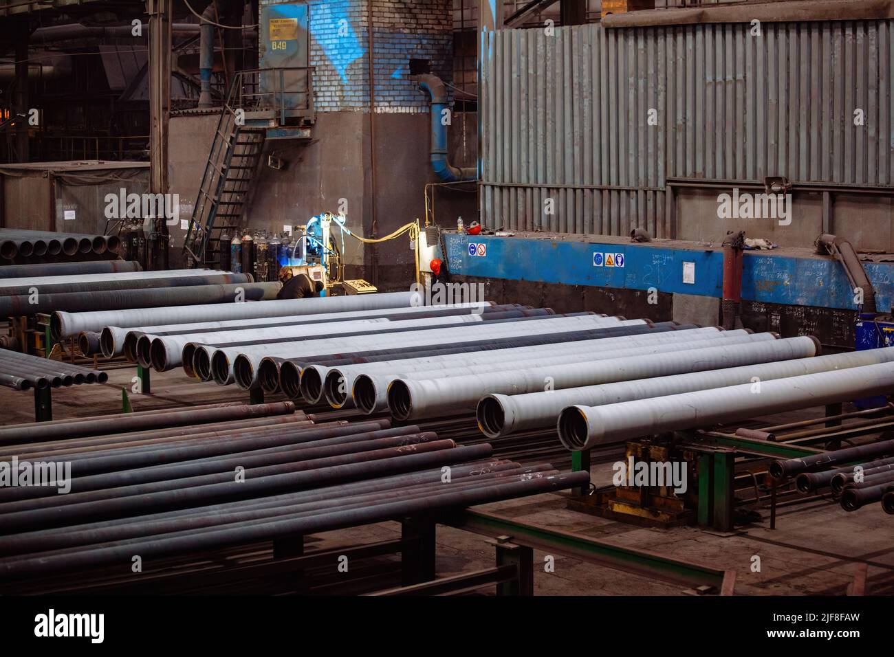 Cast iron pipes manufacturing process Stock Photo Alamy