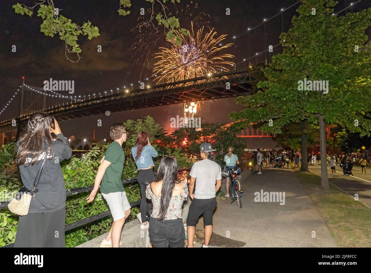 New York, United States. 29th June, 2022. Spectators watch fireworks