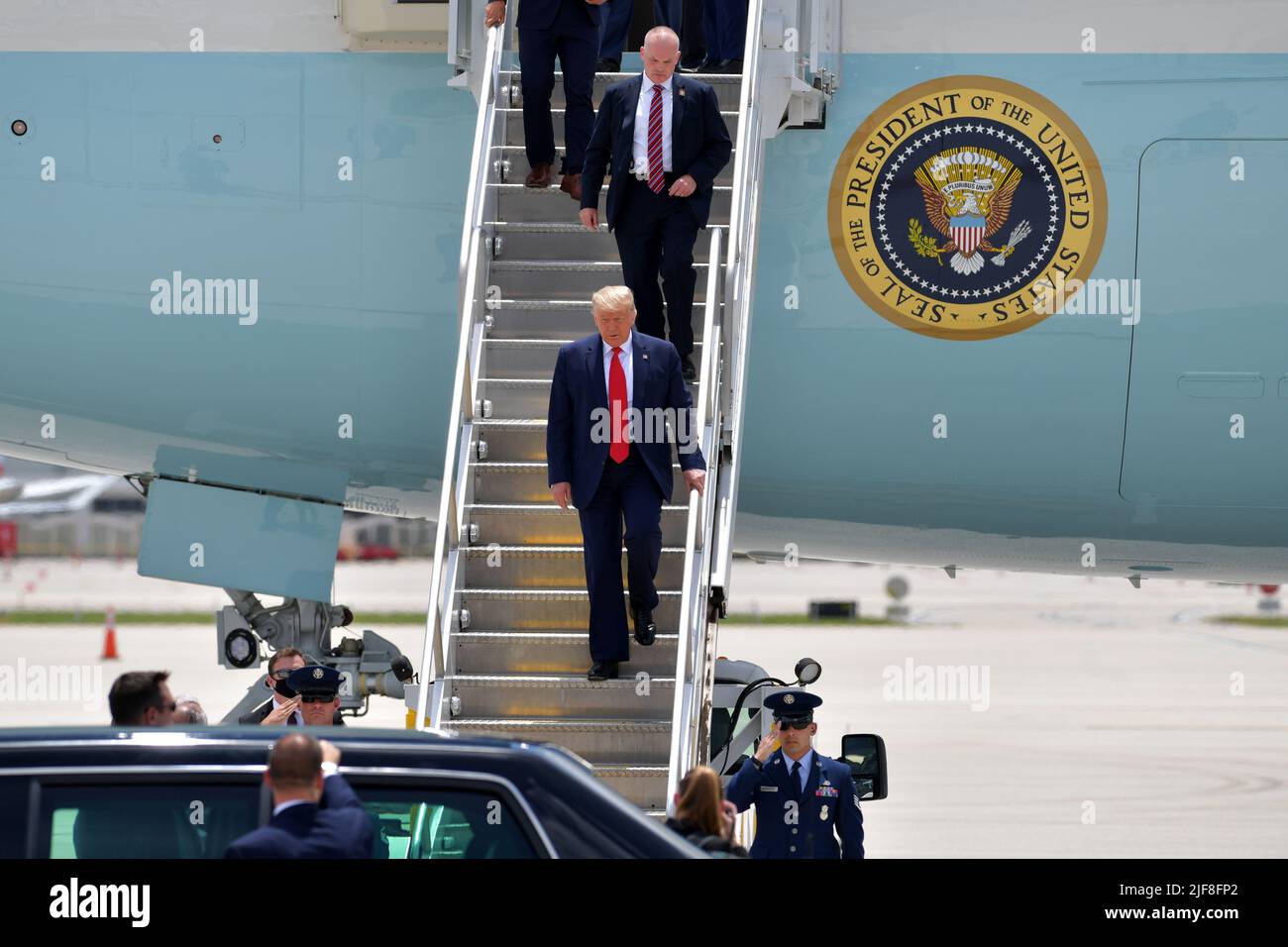 Miami, United States Of America. 10th July, 2020. MIAMI, FL - JULY 10: US President Donald Trump arriving at Miami International Airport on July 10, 2020 in Miami, Florida. The President was greeted by Carlos A. Gimnez Mayor of Miami-Dade County and is in town to receive a briefing on SOUTHCOM Enhanced Counternarcotics Operation and to attend Iglesia Doral Jesus Worship Center to participate in a roundtable on Supporting the People of Venezuela People: President Donald Trump Credit: Storms Media Group/Alamy Live News Stock Photo