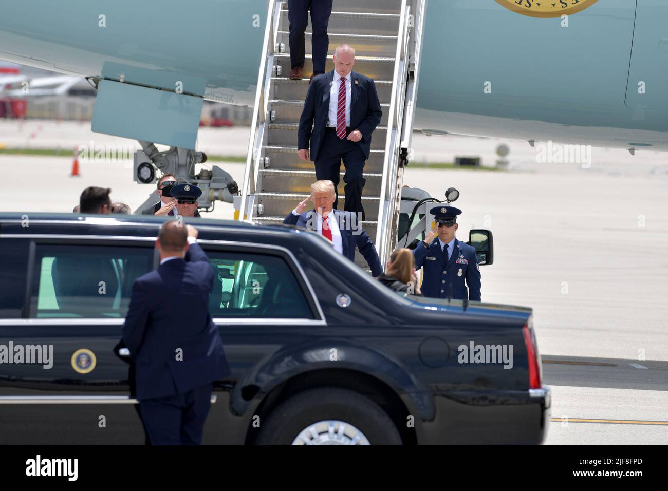 Miami, United States Of America. 10th July, 2020. MIAMI, FL - JULY 10: US President Donald Trump arriving at Miami International Airport on July 10, 2020 in Miami, Florida. The President was greeted by Carlos A. Gimnez Mayor of Miami-Dade County and is in town to receive a briefing on SOUTHCOM Enhanced Counternarcotics Operation and to attend Iglesia Doral Jesus Worship Center to participate in a roundtable on Supporting the People of Venezuela People: President Donald Trump Credit: Storms Media Group/Alamy Live News Stock Photo