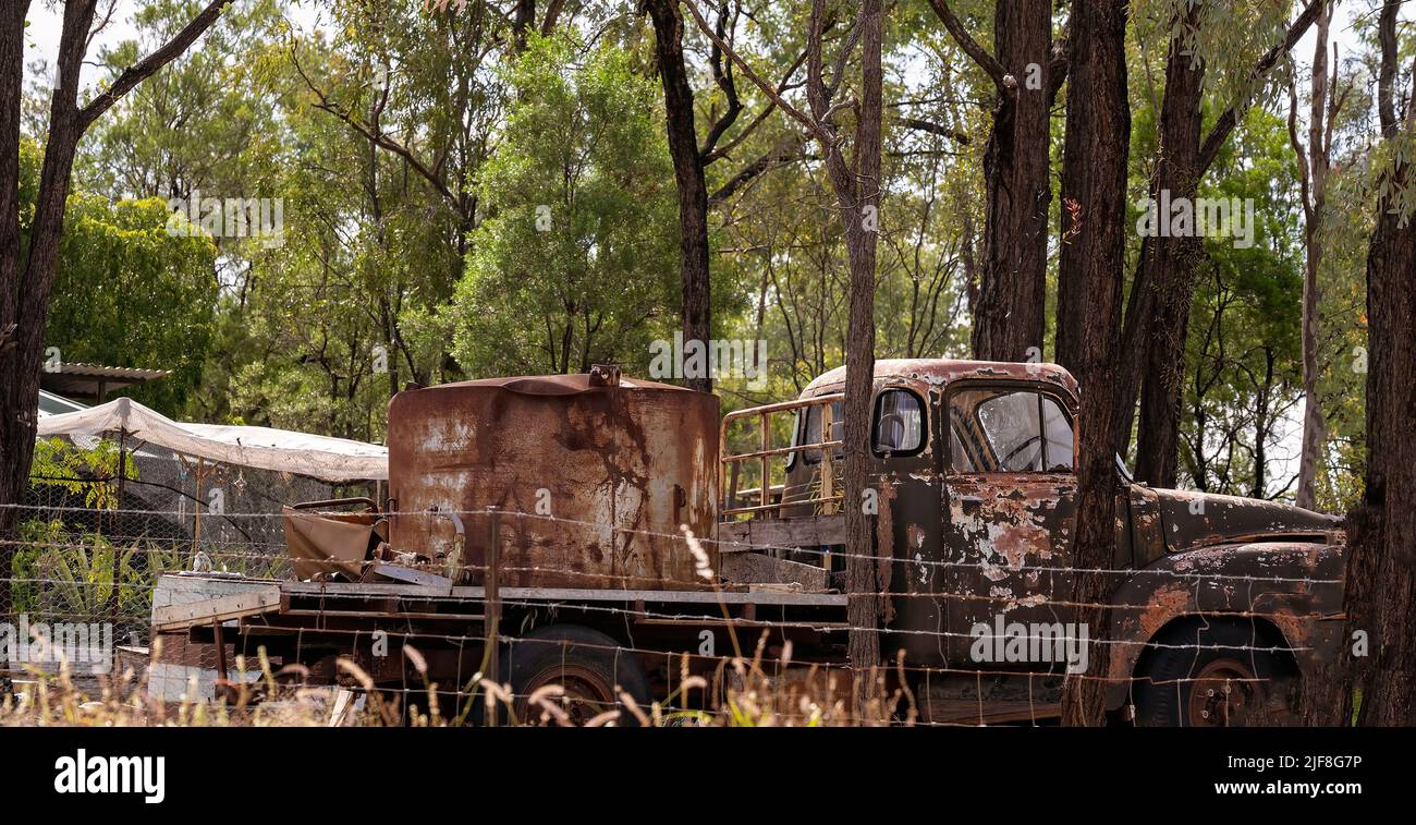 Rubyvale Gemfields Fosscing Old rusting truck with a water tank on the back sitting rotting away ...