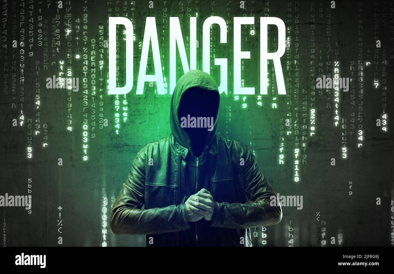 Faceless hacker with inscription concept Stock Photo