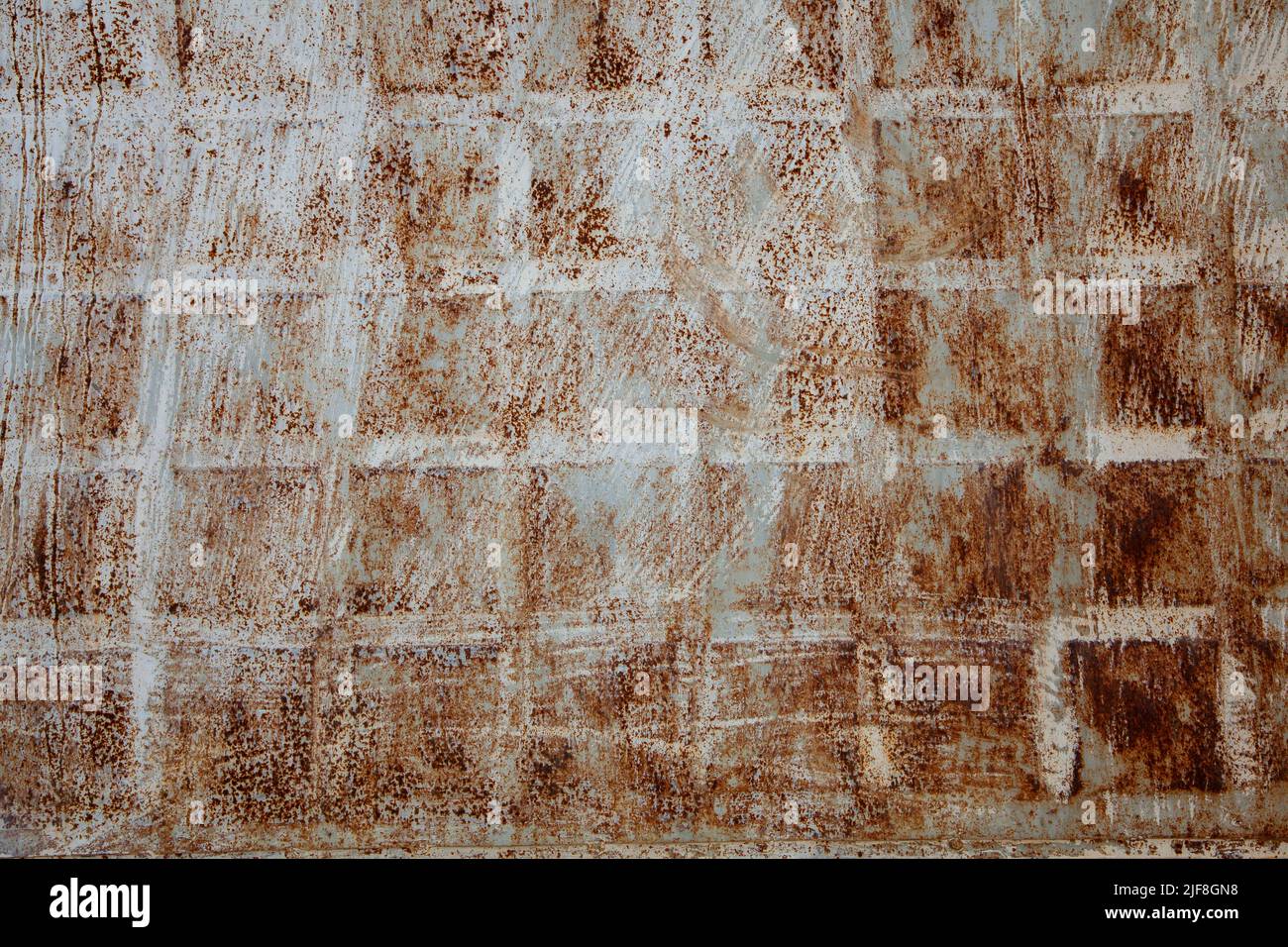 Rusted, old iron door with peeling white paint Stock Photo Alamy