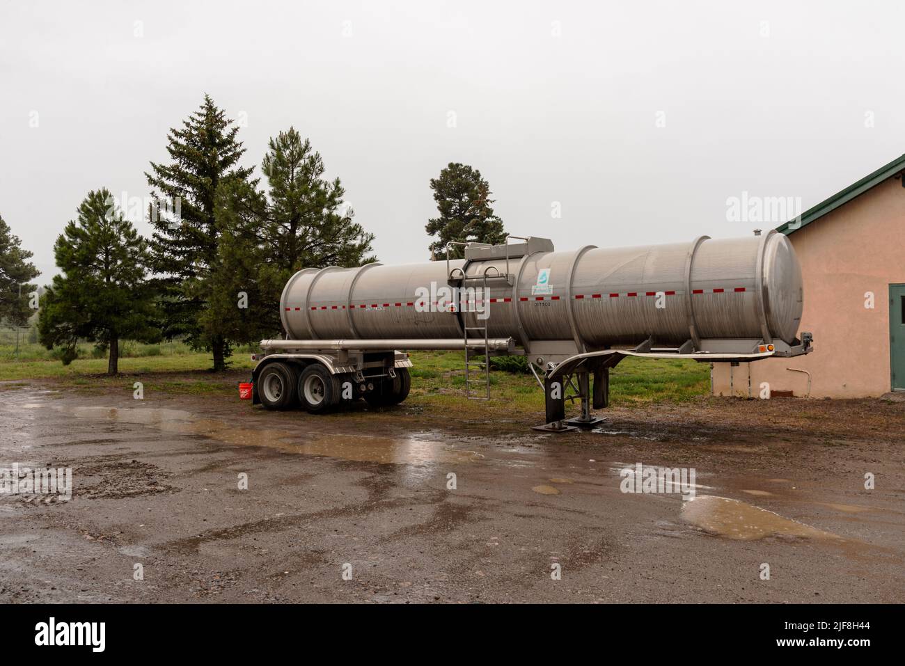 A water tank filled with water for residents of the Chama, New Mexico