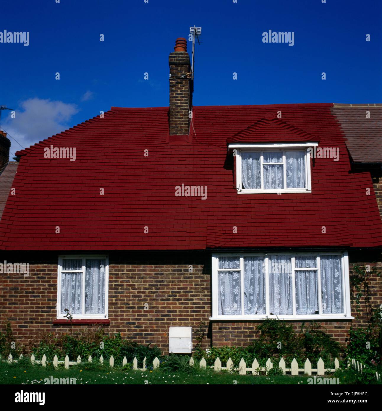 House with Red Slate Roof and Chimney England Stock Photo