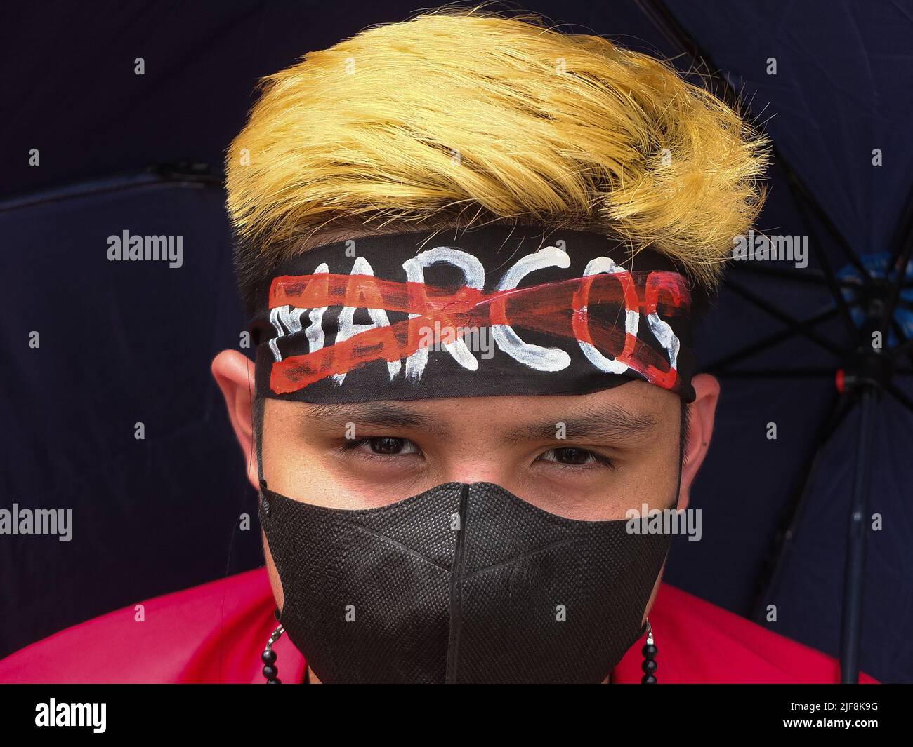 Quiapo Lettering Manila, Philippines. 30th June, 2022. A protester's headband with a red ...