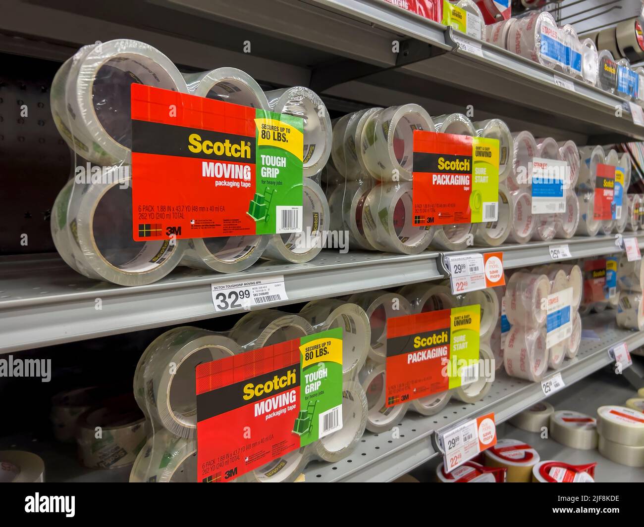 Mill Creek, WA USA - circa June 2022: Angled view of packing tape for sale inside a Staples store. Stock Photo