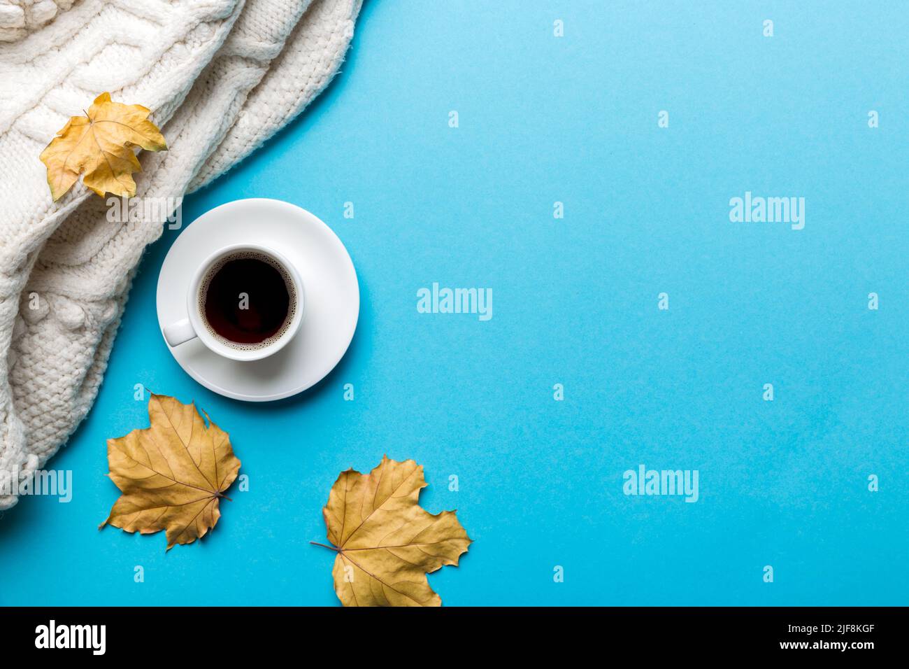 Flat lay composition with colorful Autumn cup of coffee and leaves on a ...
