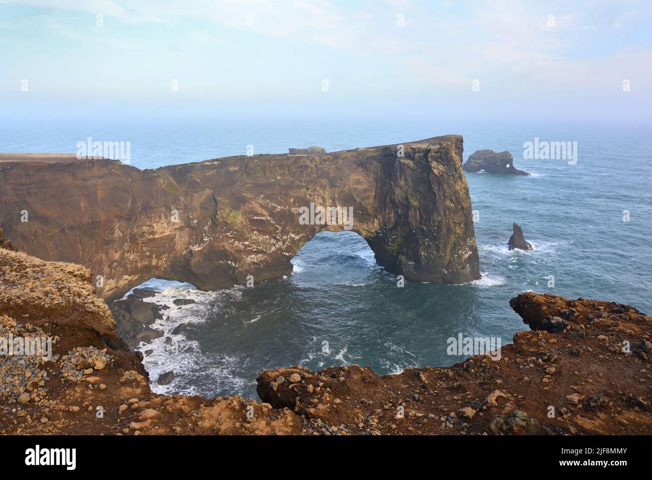 Dyrhólaey sea arch and cliffs, near Vik, Iceland Stock Photo