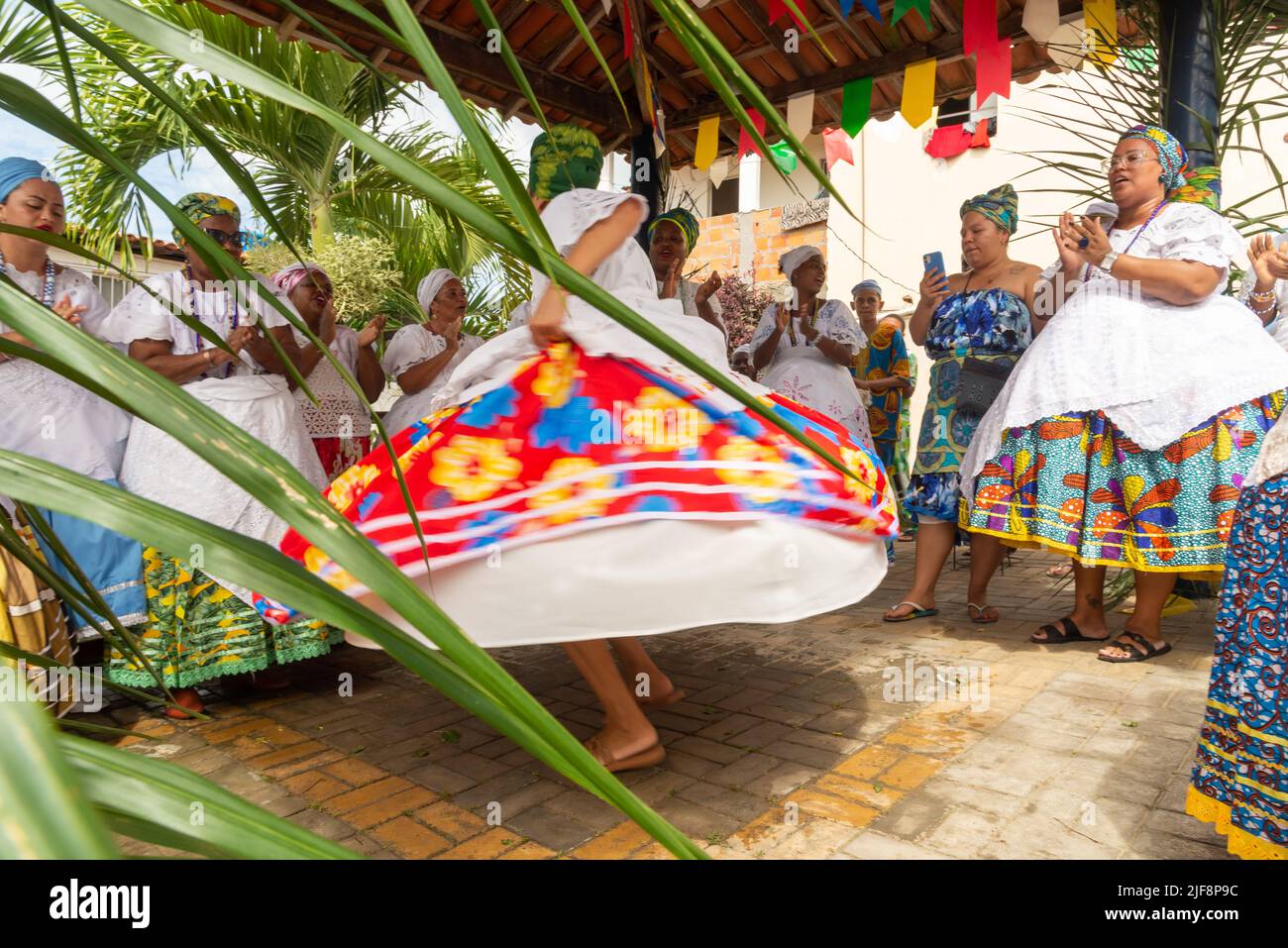 Saubara, Bahia, Brazil - June 12, 2020: Candomble members dancing and singing at the religious festival in Bom Jesus dos Pobre district, Saubara city. Stock Photo