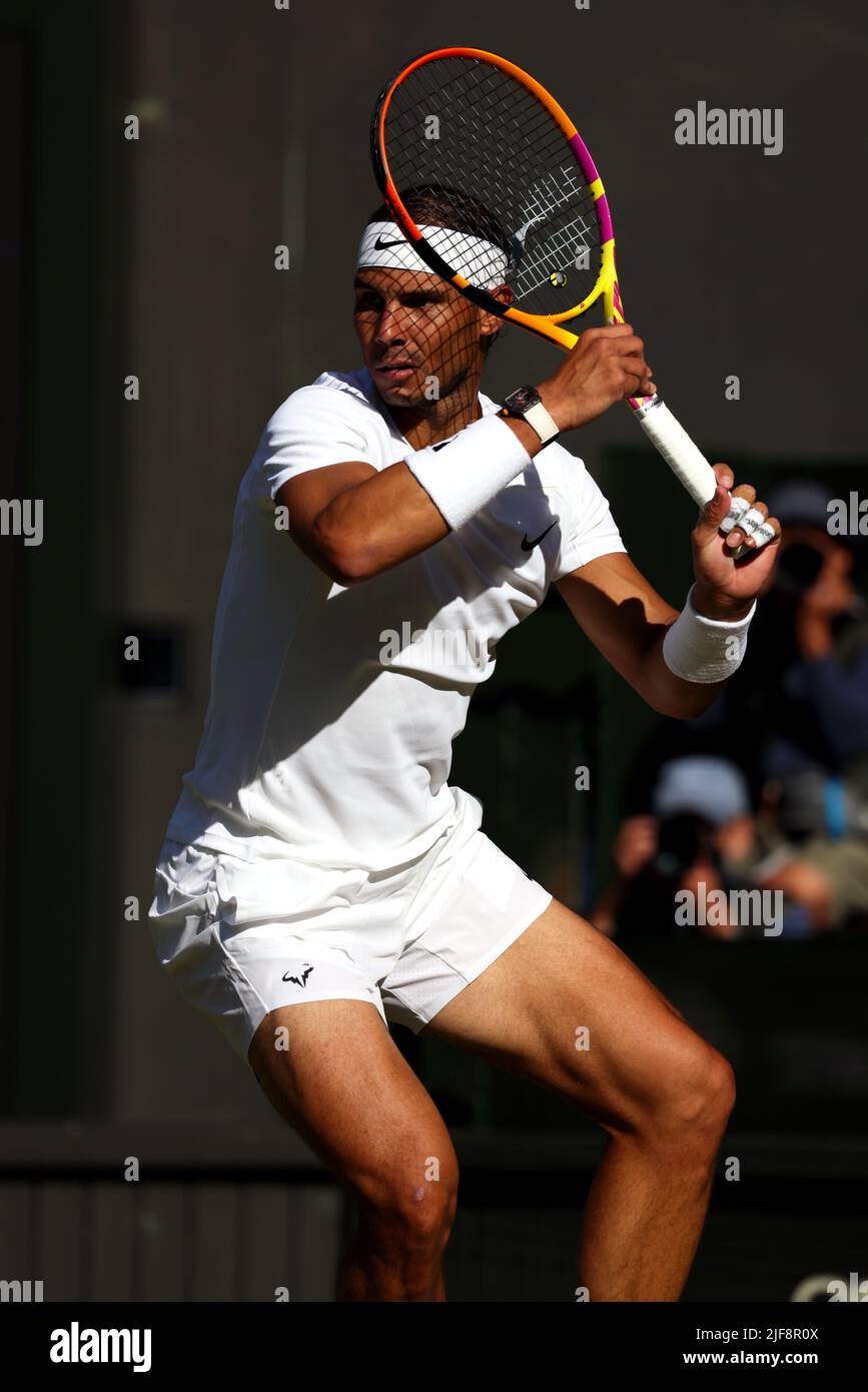 Rafael Nadal prepares for a forehand during his second hand match against Ricardas Berankis of Lithuania on Centre Court at Wimbledon