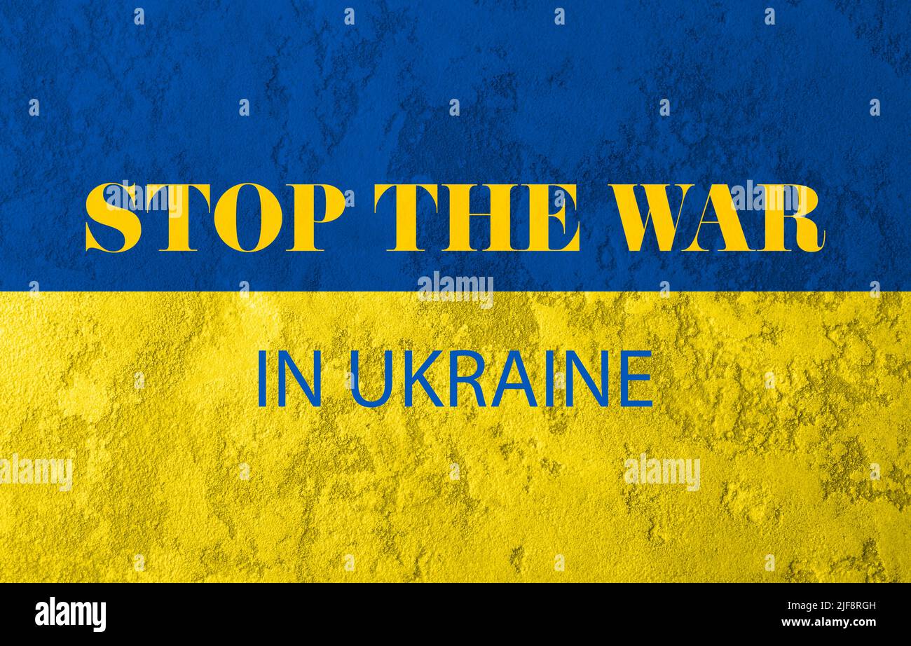 Concrete wall colored with Ukrainian flag colors. Stop the war in Ukraine Stock Photo