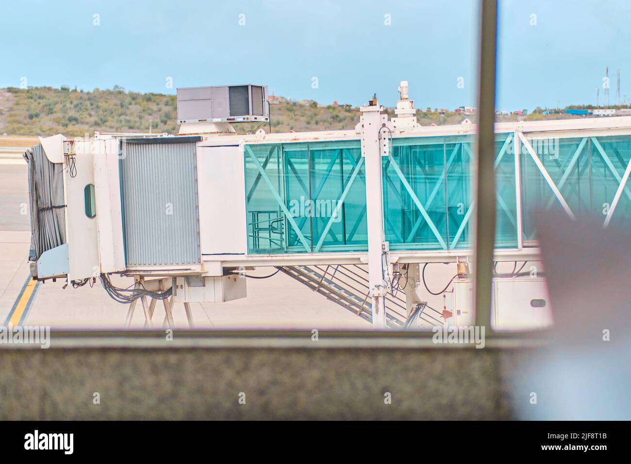 Jetway waiting for a plane to arrive on airport.airport terminal