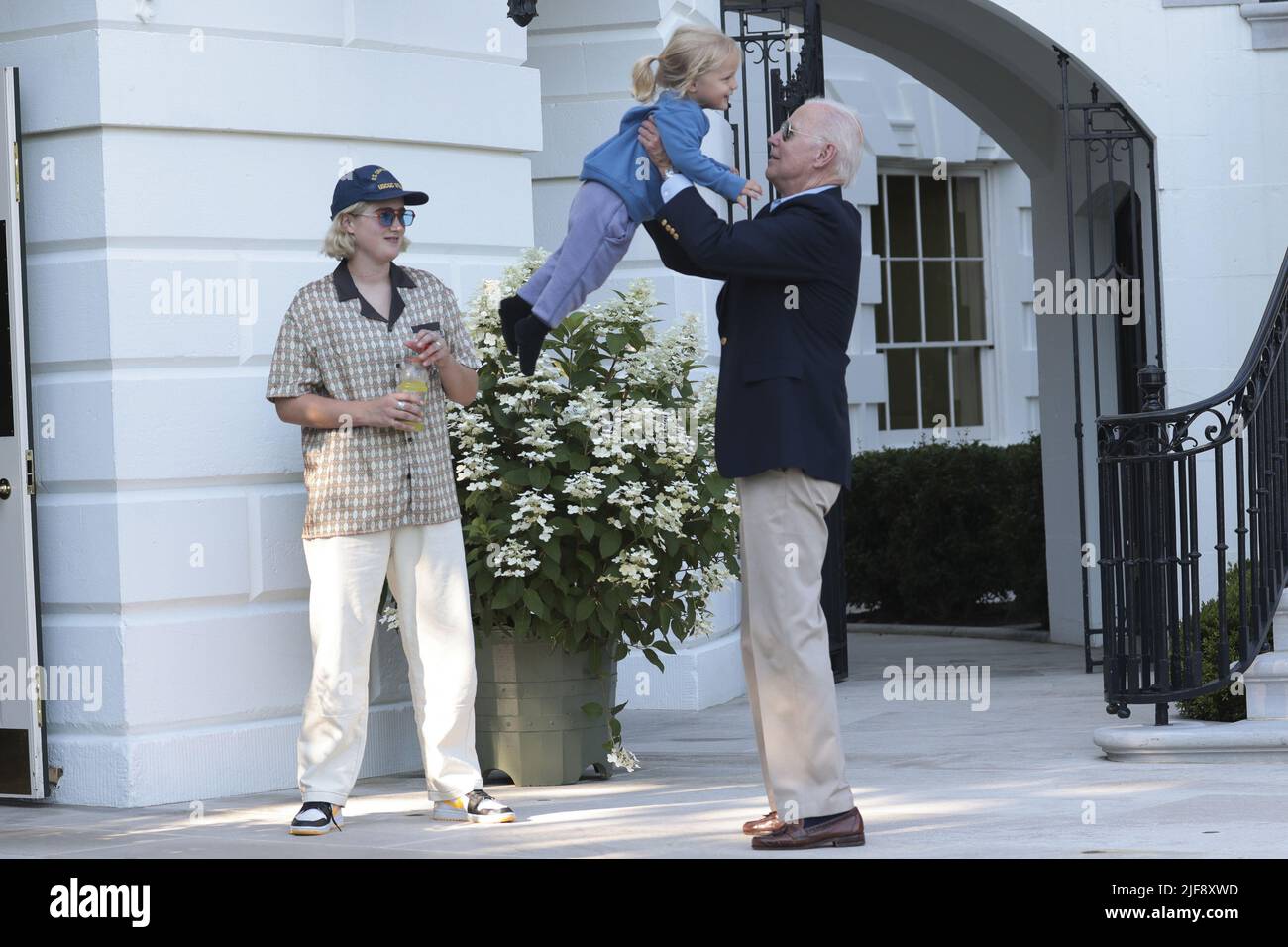Washington, United States. 30th June, 2022. President Joe Biden greets his grandson Beau, center, the son of Hunter Biden, and granddaughter Maisy Biden, left, after Biden returned to Washington, DC on Thursday, June 30, 2022. Biden returned to Washington after attending summits in Germany and Spain. Photo by Oliver Contreras/UPI Credit: UPI/Alamy Live News Stock Photo