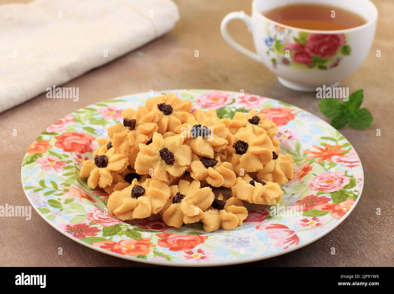 Kue Semprit, Indonesian Traditional Cookies Served to Celebrate Lebaran Idul Fitri Ied Mubarak. Made from Butter, Flour, Egg, with Flower Shape Stock Photo