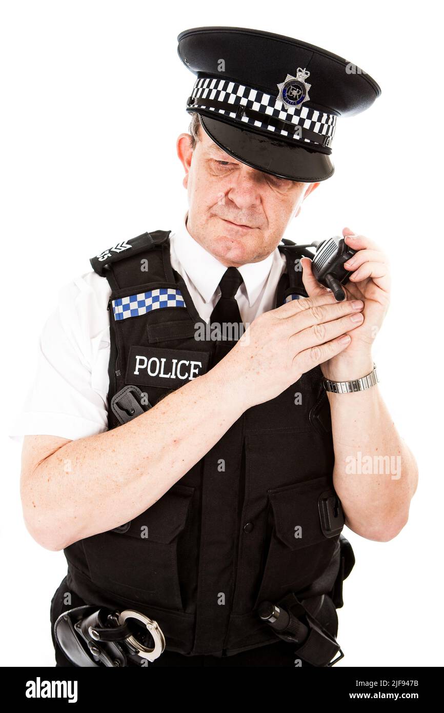 A UK uniformed policeman making use of his radio. Part of a series of images with the same character model. Stock Photo