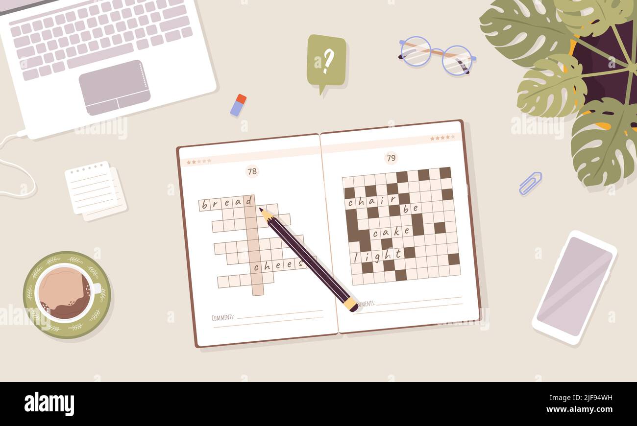 Crossword puzzle. Learning and leisure concept. Top view workplace