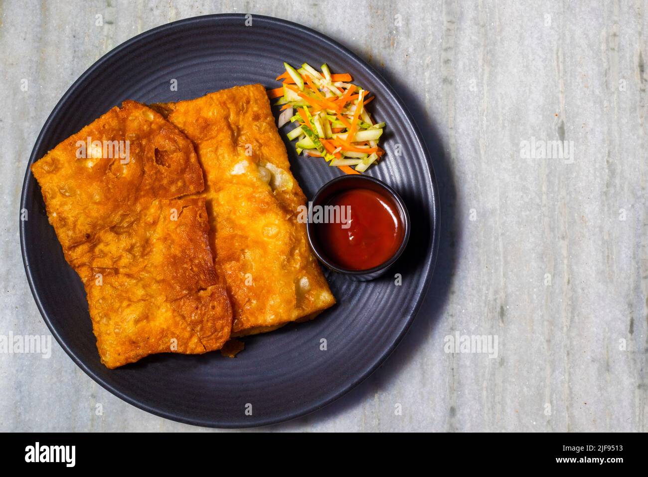 selective focus of delicious Indian food Mughlai Paratha is ready to eat. Stock Photo