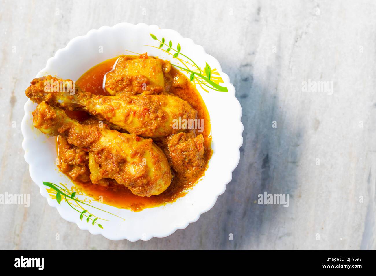 delicious Bengali style chicken curry is ready to serve. Stock Photo