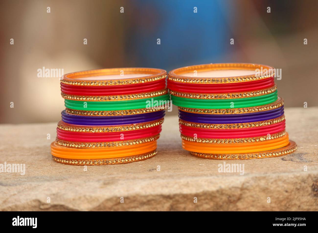 some colorful bangles put on stone Stock Photo