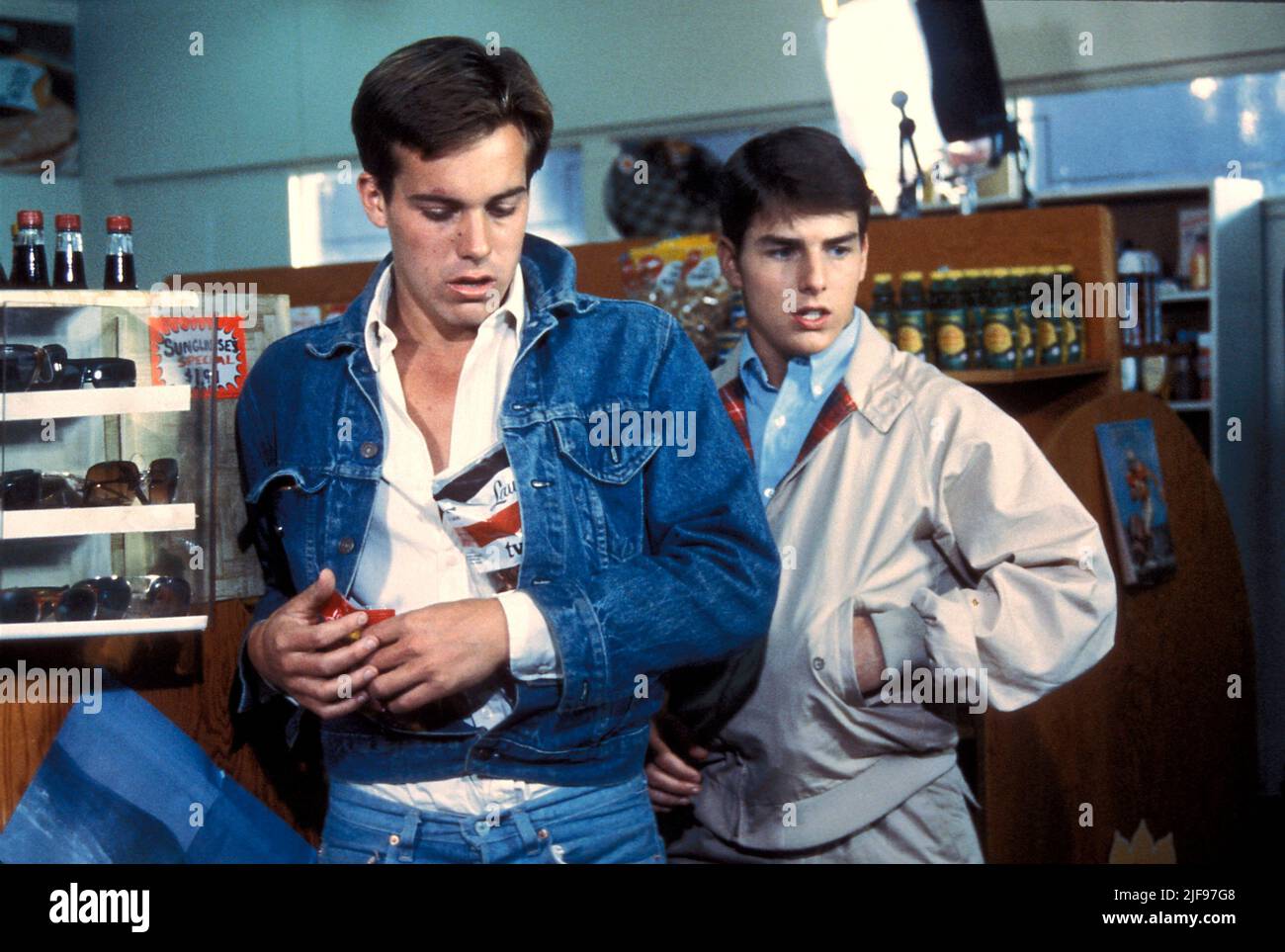 TOM CRUISE and JOHN STOCKWELL in LOSIN' IT (1983), directed by CURTIS HANSON. Credit: Tiberius Productions / Album Stock Photo
