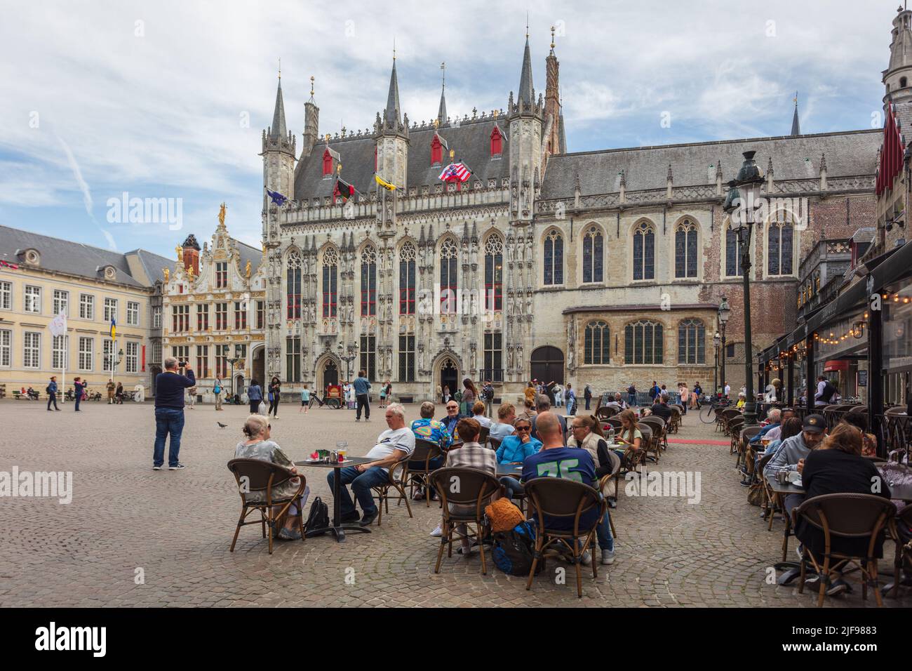 The gothic City hall of Bruges, a 14th century building, rests at the centre of Burg Square. Belgium. Stock Photo