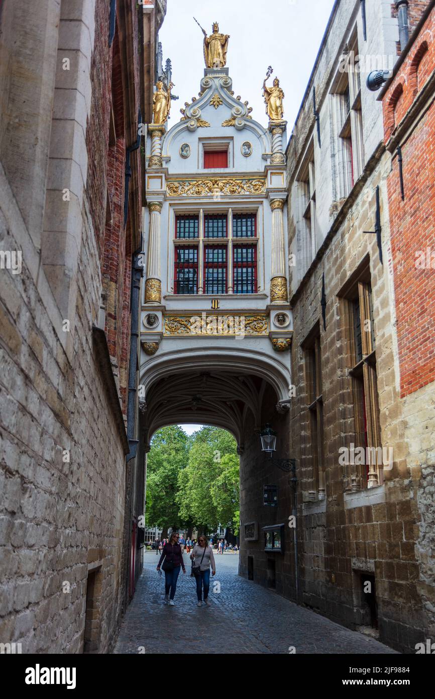 Blinde Ezelstraat is a doorway to Burg square in Bruges. Belgium. Stock Photo