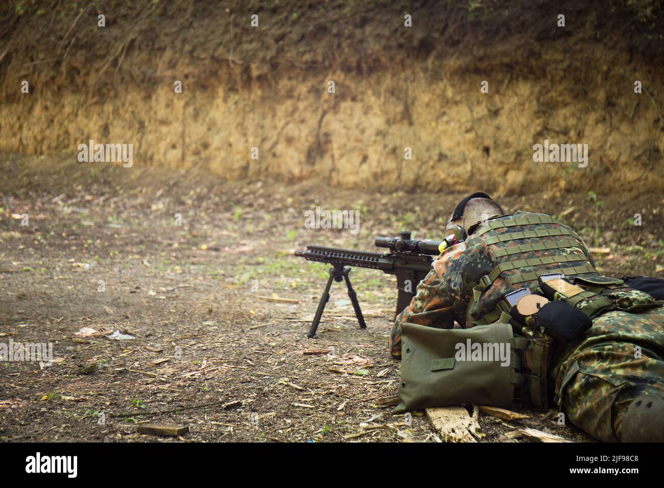 Portrait of a Ukrainian military man with a assault rifle Ar-15 in his ...