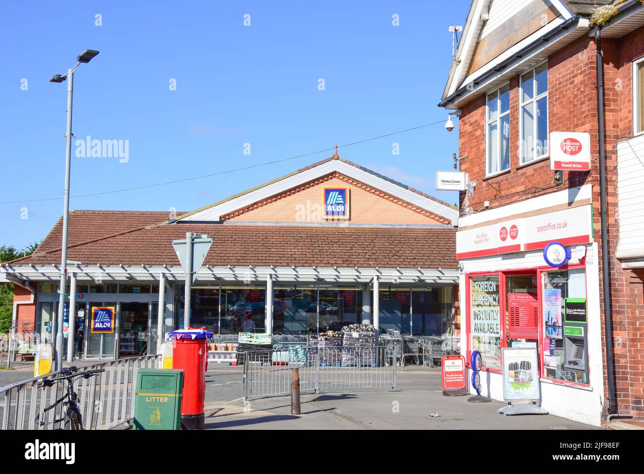 Prestatyn, UK. Jun 22, 2022. Meliden Road has a mixture of residential and commercial properties. The pavement is cluttered with many obstacles Stock Photo
