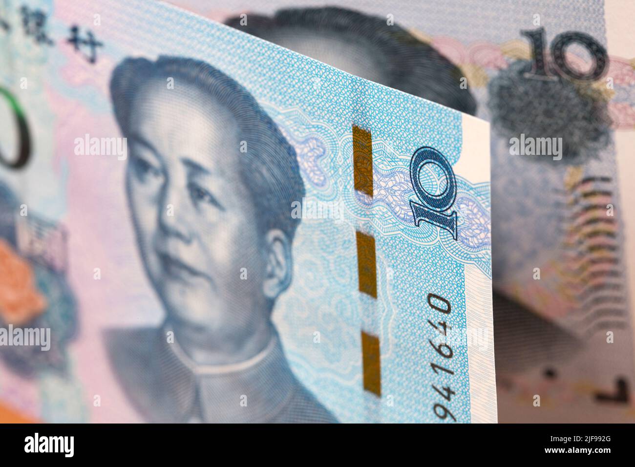 Chinese money - 10 Yuan - business background - Renminbi Stock Photo