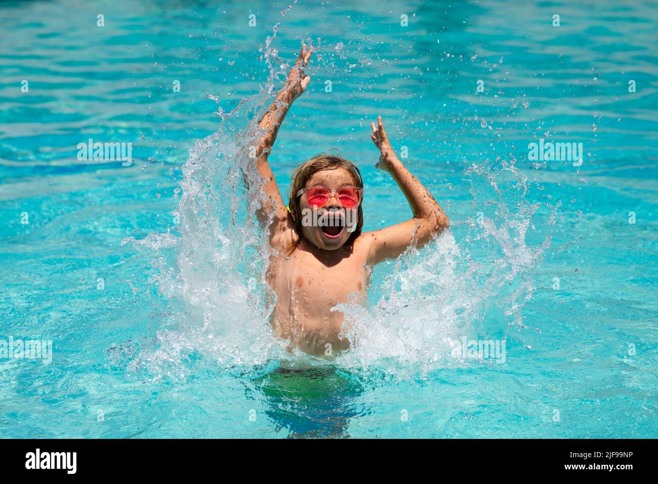 Young boy swim in pool. Child boy rest in swimming pool Stock Photo Alamy