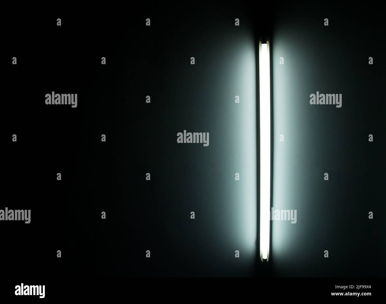 Detail of a fluorescent light tube on a wall. fluorescent light tube
