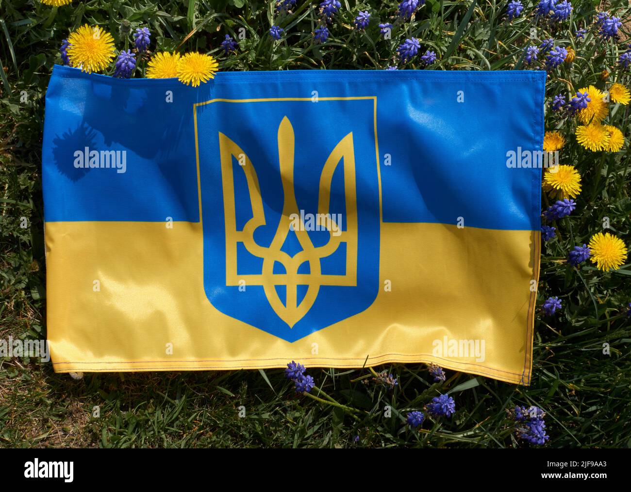 Ukrainian yellow-blue flag support Ukraine. No War, stop russia, pray for peace. Ukrainian crisis, Russian aggression in Ukraine. War of Russia against Ukraine. Stock Photo