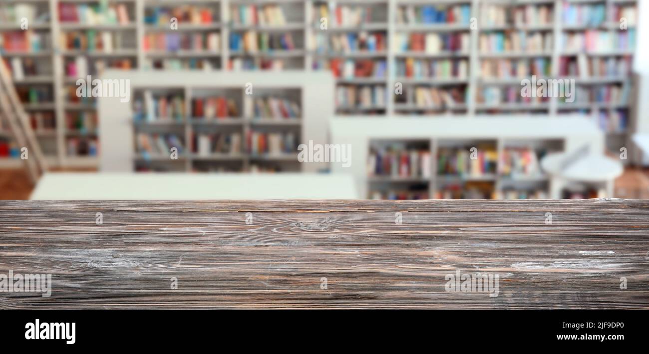 Empty table in modern library Stock Photo - Alamy