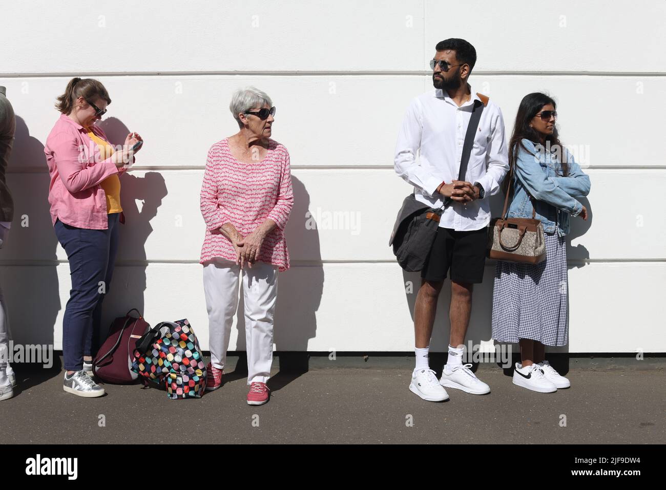 People queuing to enter Wimbledon ahead of day five of the 2022