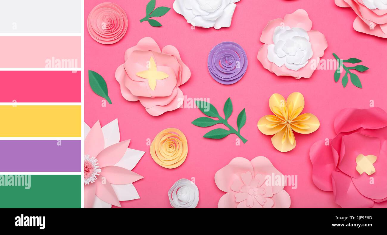 Beautiful handmade paper flowers on pink background. Different color ...