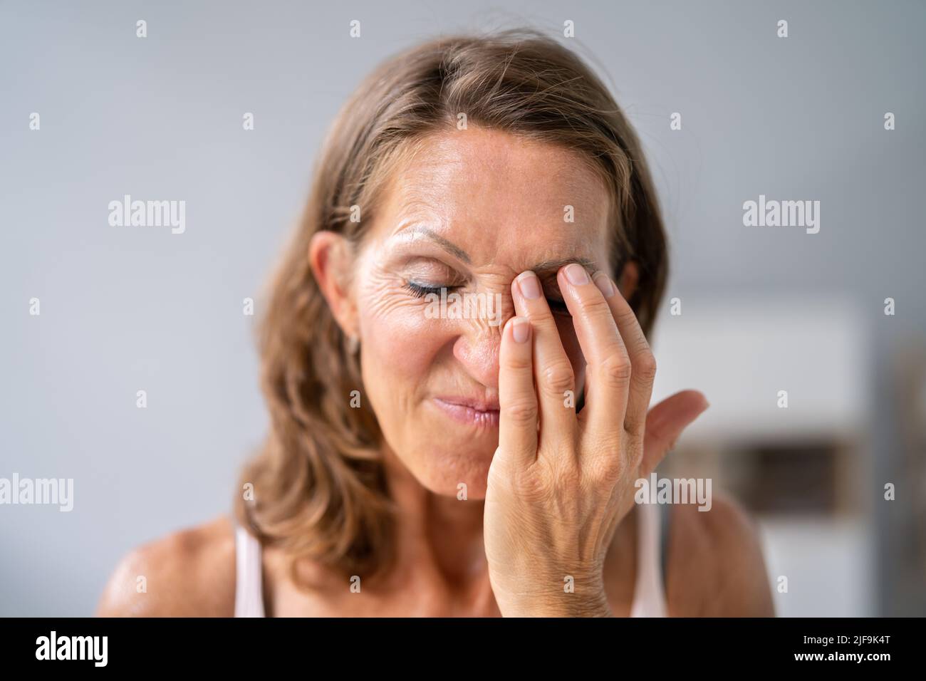 Eye Burning Pain Spasm And Fatigue. Cataract Symptoms Stock Photo