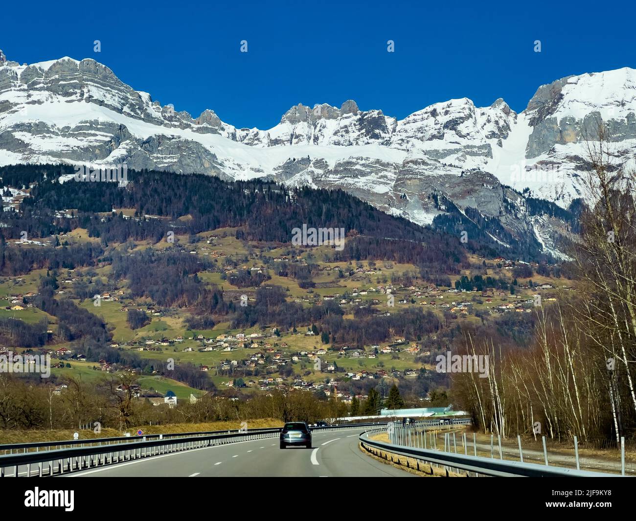 Chaine des Aravis mountains and Cordon village from A40 Stock Photo