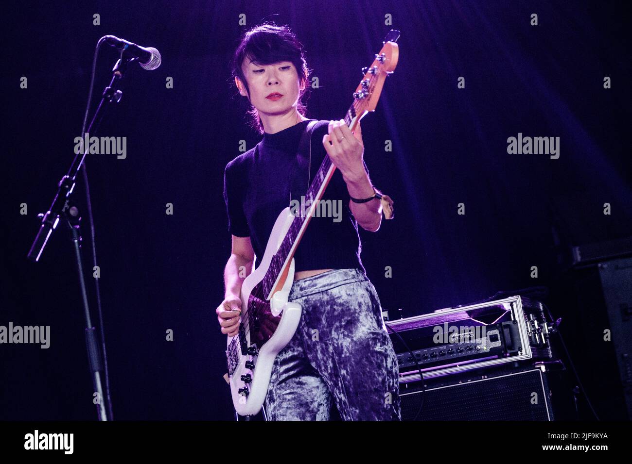 Roskilde, Denmark. 30th June, 2022. Bass player Toko Yasuda performs live with the Welsh singer and musician Cate Le Bon during the Danish music festival Roskilde Festival 2022 in Roskilde. (Photo Credit: Gonzales Photo/Alamy Live News Stock Photo