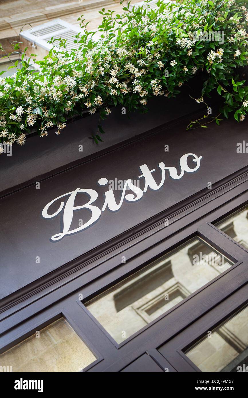 Jasmine on the facade of a vintage French bistro Stock Photo