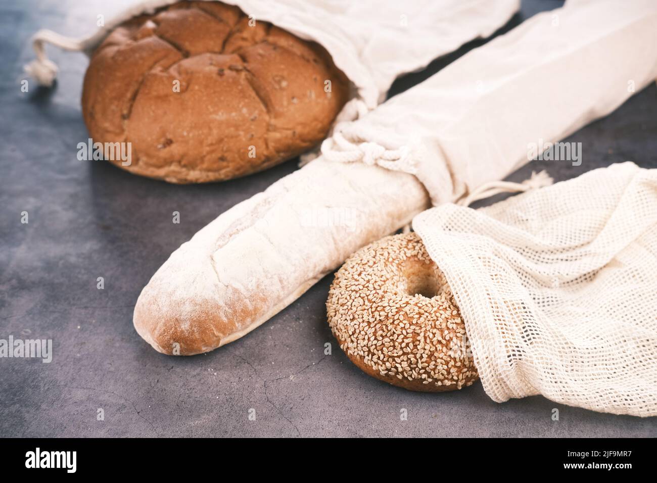 baked bread stored in a reusable linen bag . Eco friendly Zero waste