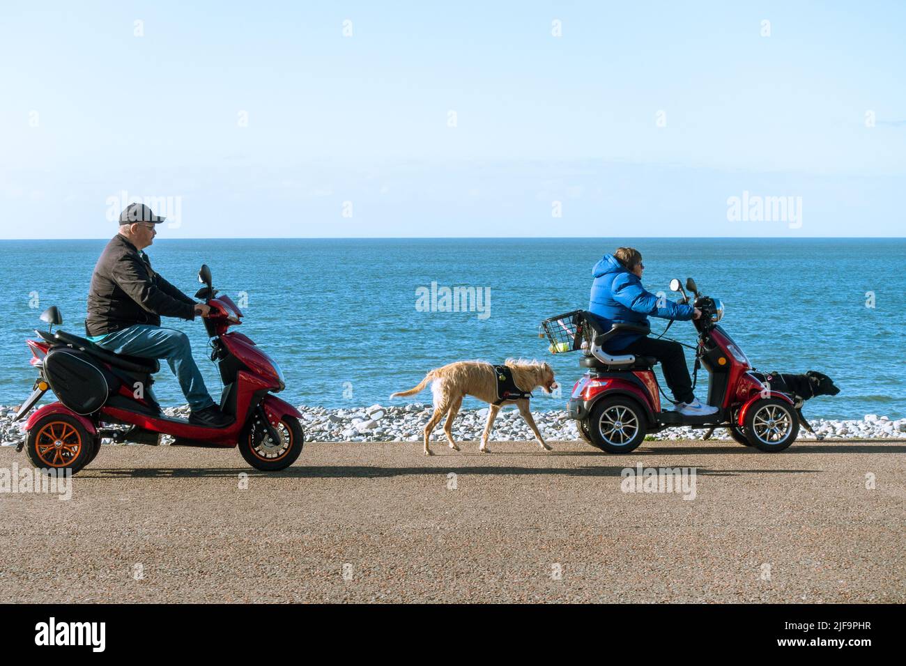 Llandudno. Mobility scooters in use on Llandudno seafront  esplanade or promenade Stock Photo