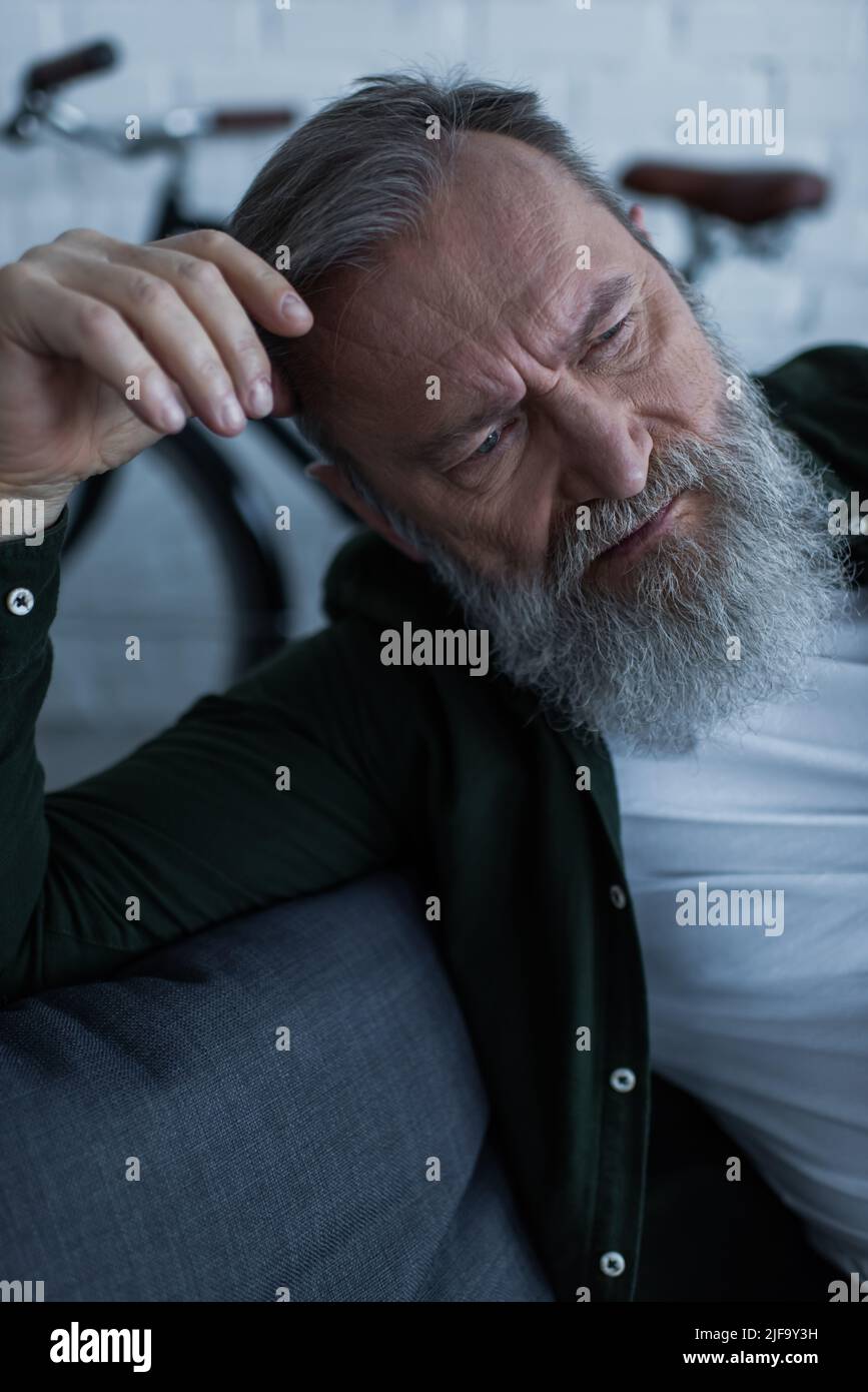 Handsome upset man suffering hi-res stock photography and images - Alamy