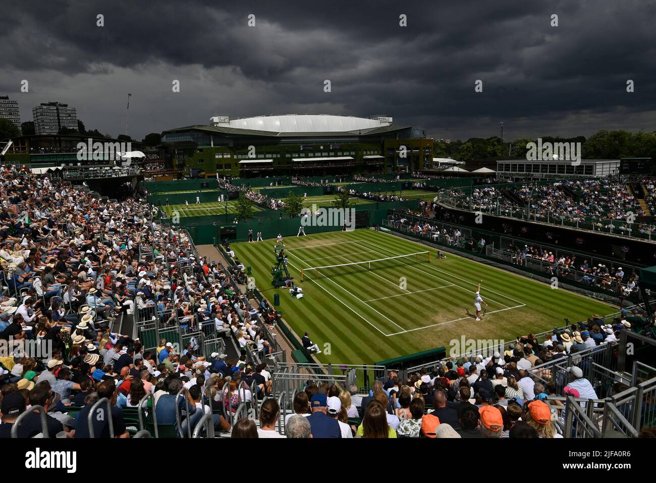 Tennis - Wimbledon - All England Lawn Tennis and Croquet Club, London, Britain - July 1, 2022 General view of Netherlands' Tim van Rijthoven in action during his third round match against Georgia's Nikoloz Basilashvili REUTERS/Toby Melville     TPX IMAGES OF THE DAY Stock Photo
