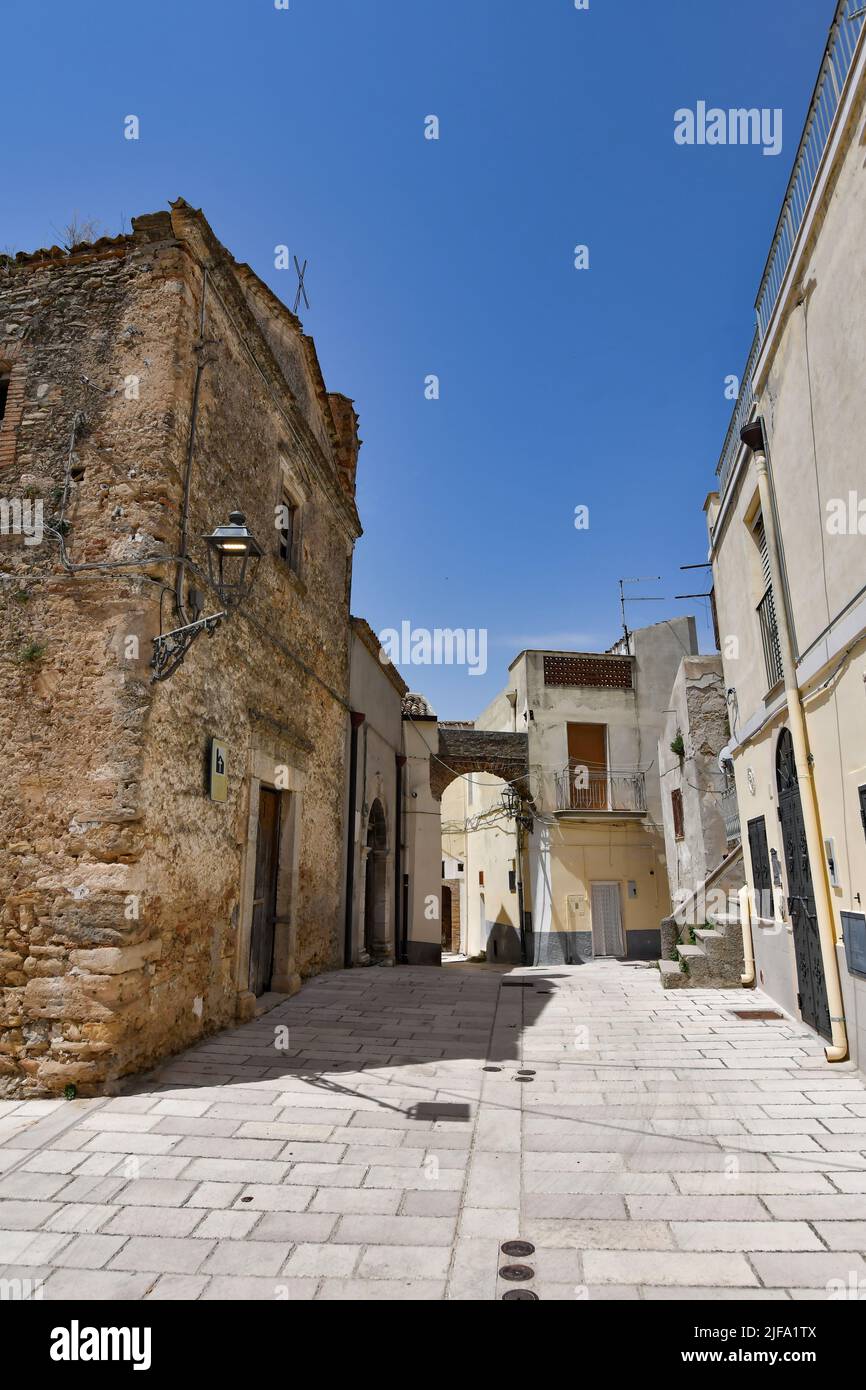 A small street between the old houses of Irsina, a village in the