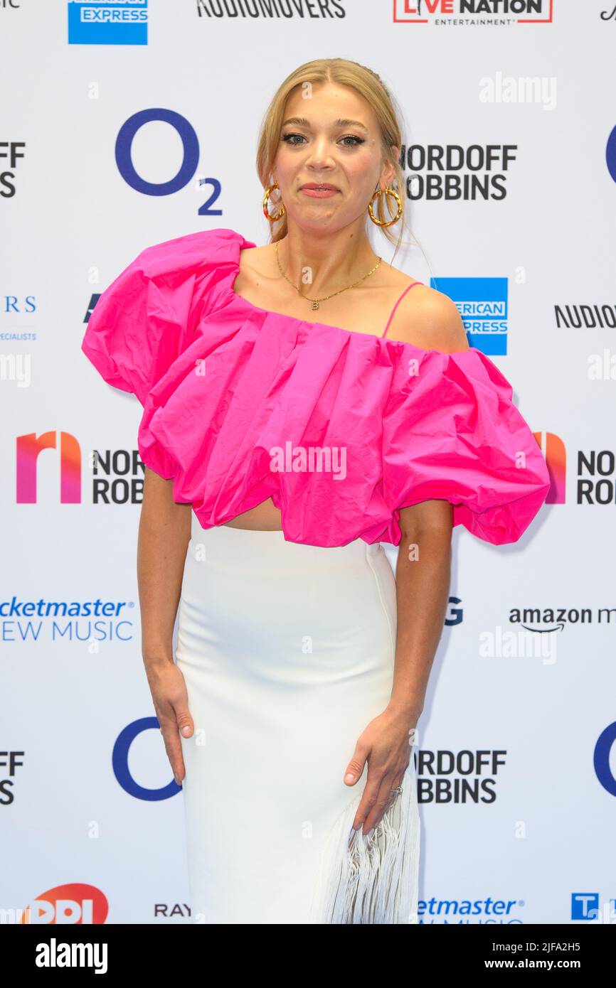 London, UK. 1st July, 2022. Becky Hill attending the Nordoff Robbins O2 Silver Clef Awards at the Grosvenor House Hotel, London. Picture date: Friday July 1, 2022. Photo credit should read Credit: Matt Crossick/Alamy Live News Stock Photo