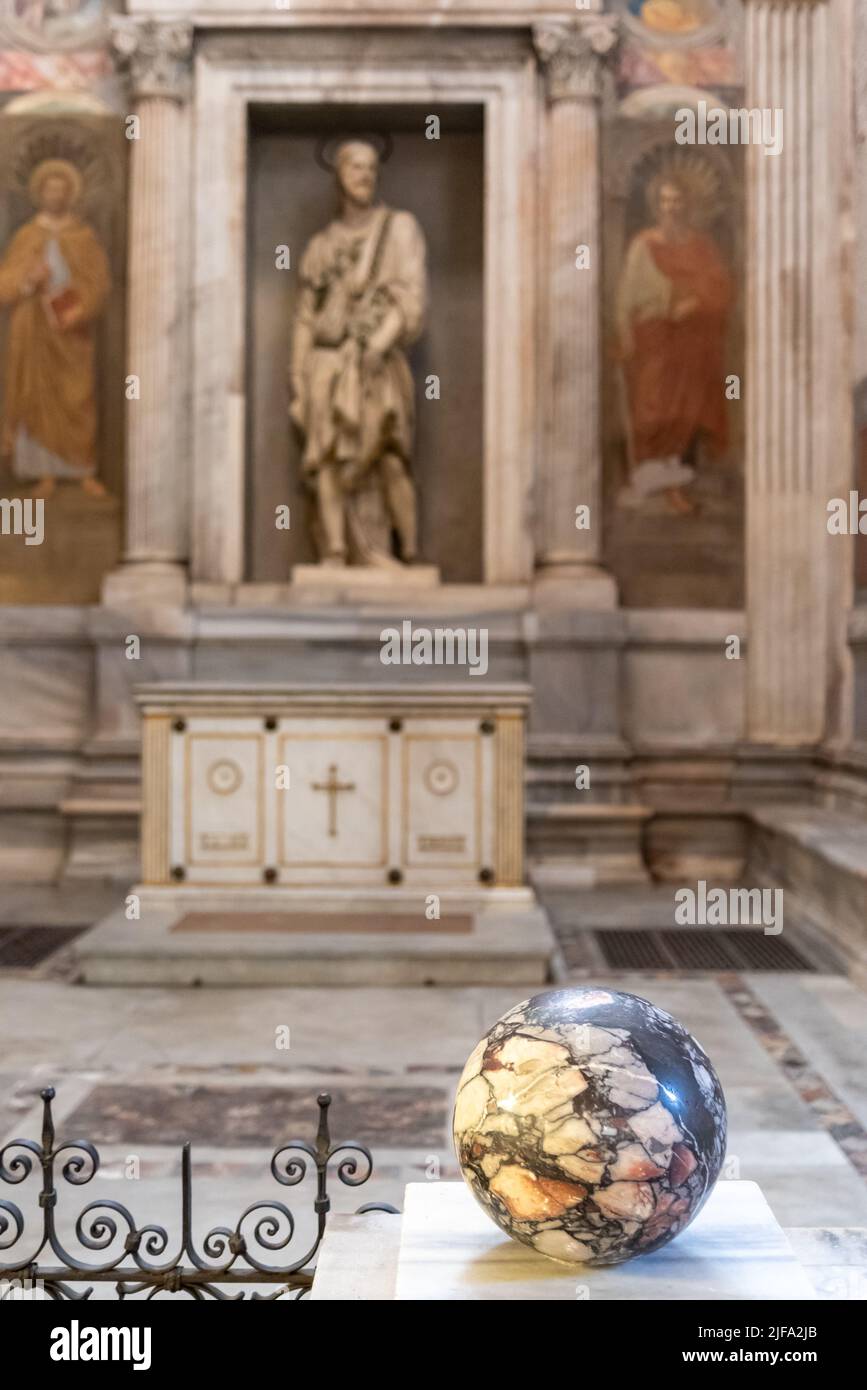 Colorful marble ball decorating hall with statue and frescoes inside Saint Peter Basilica in the Vatican Stock Photo